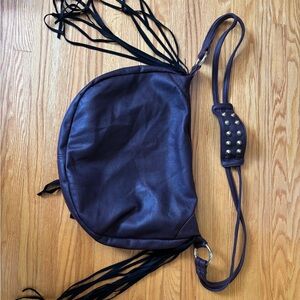 Dark purple vegan leather cross body bag with tassels and stud details